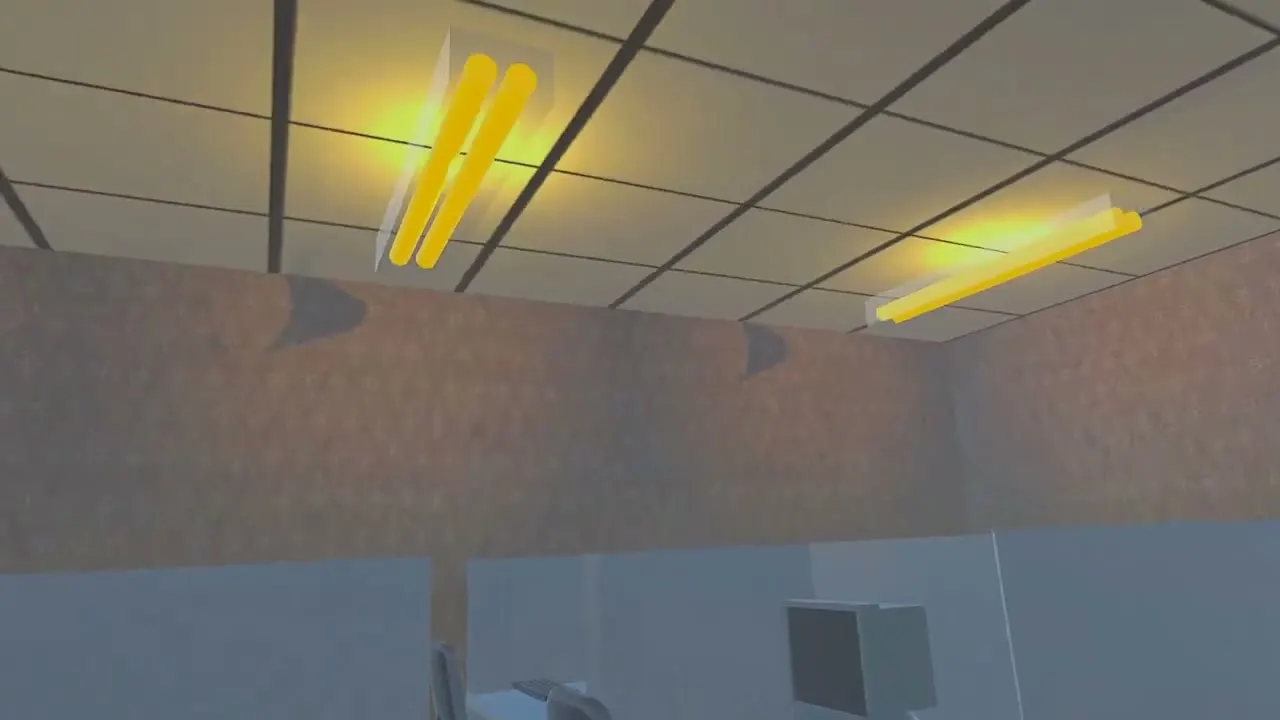 Office ceiling with glowing fluorescent lights above the cubicles