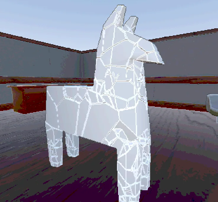 A white low-poly llama piñata with cracked panels in a dim room